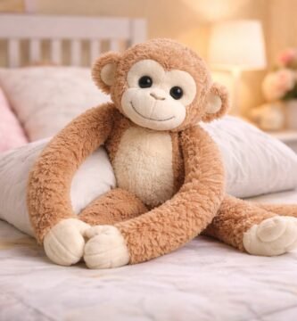 La Peluche Singe à Longs Bras